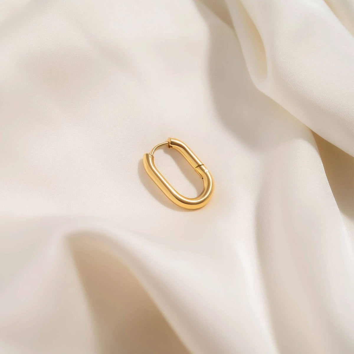 Gold Oval Huggie Earrings